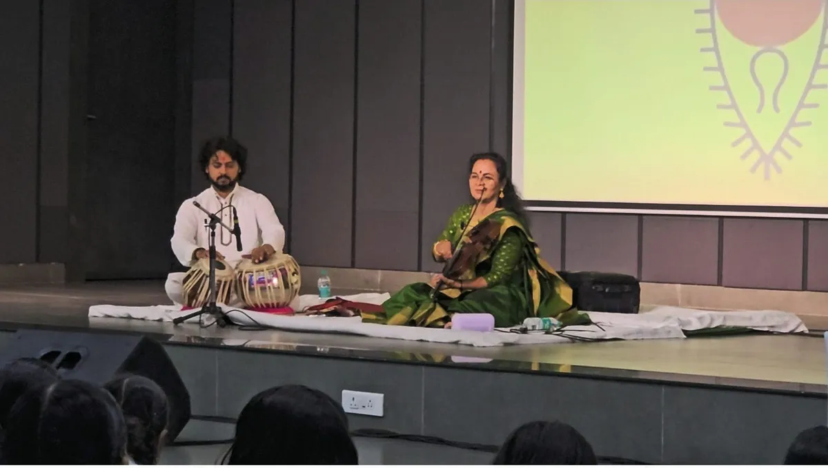 Violinist and tabla player perform on stage during violin recital at Bhavan's BVM SKN