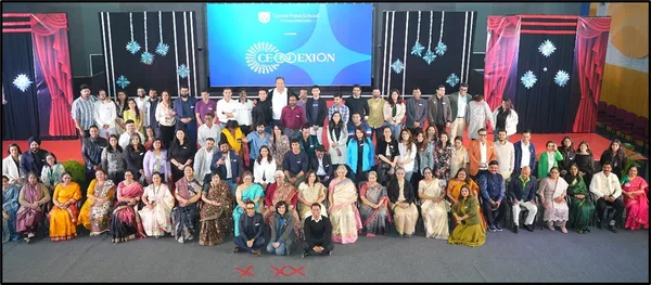 Group of alumni and teachers posed in rows on stage at CPS (Katol Road) Cennexion–2025 event