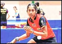 A female table tennis player in a red and black jersey at the ITTF-ATTU Asian Youth Table Tennis Championships