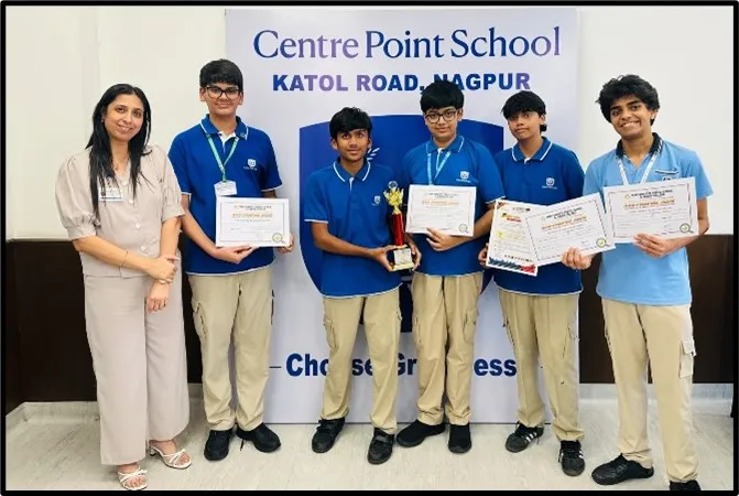 Group photo of CPS (Katol Road) principal and students holding certificates and trophy.