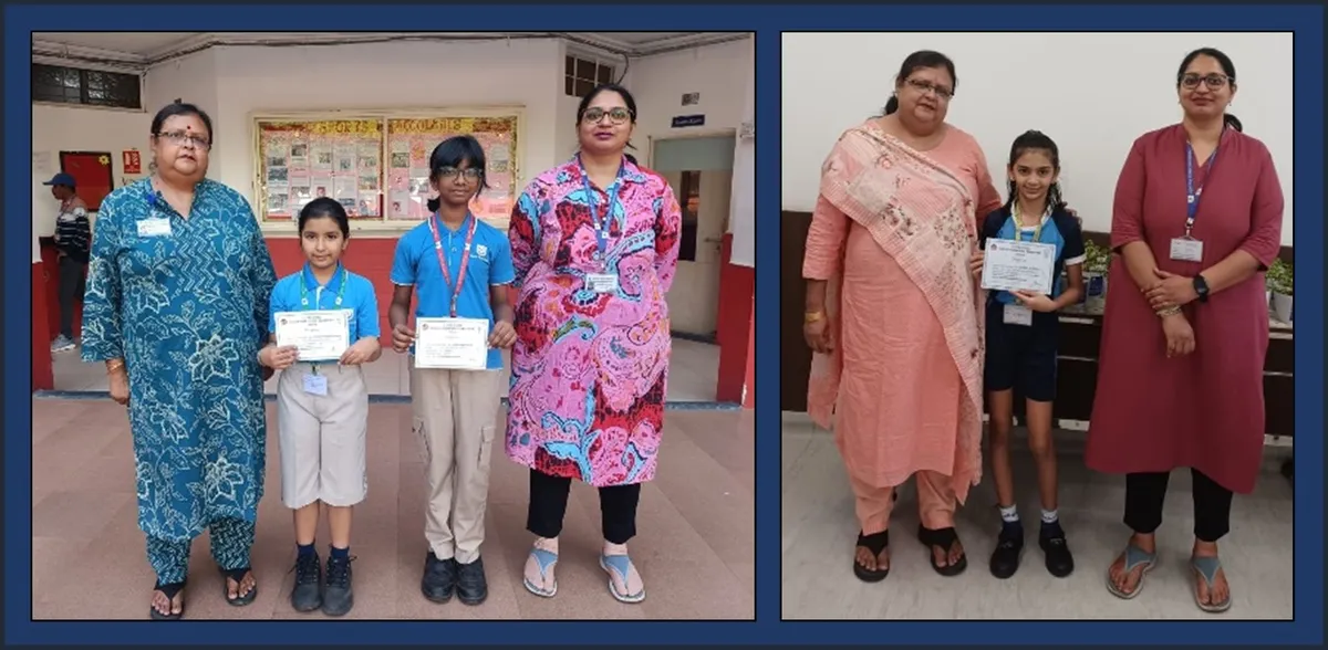 Students holding certificates standing between two adult women in a school setting.