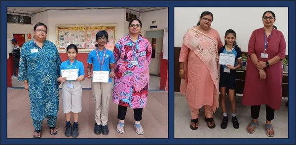 Students holding certificates standing between two adult women in a school setting.