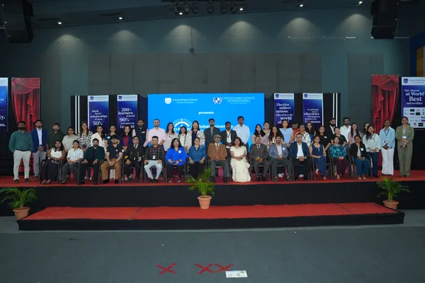 Group photo of adults and students on stage at CPS (Katol Road) Orion Global University Fair 2026