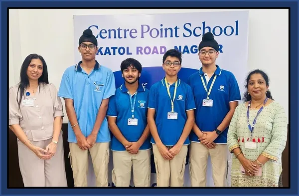 Group photo of students and women in front of CPS (Katol Road) banner