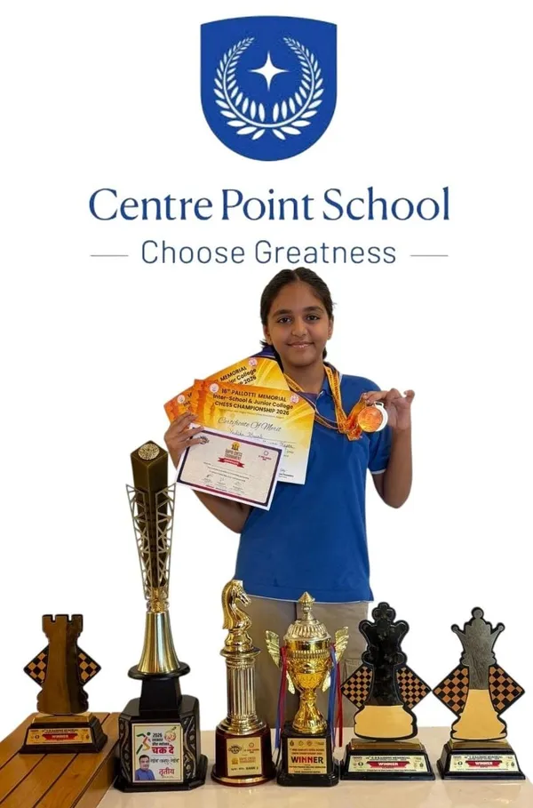 Yashika Musale holds certificates and medal in front of chess trophies, CPS (Wardhaman Nagar)