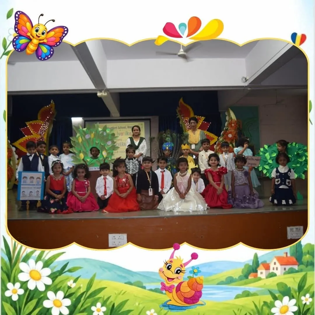 group photo of young children in costumes on a stage with decorative backdrop, framed by cartoon borders - Montfort