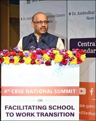 A speaker at the lectern of the 4th CBSE National Summit on Facilitating School to Work Transition in New Delhi