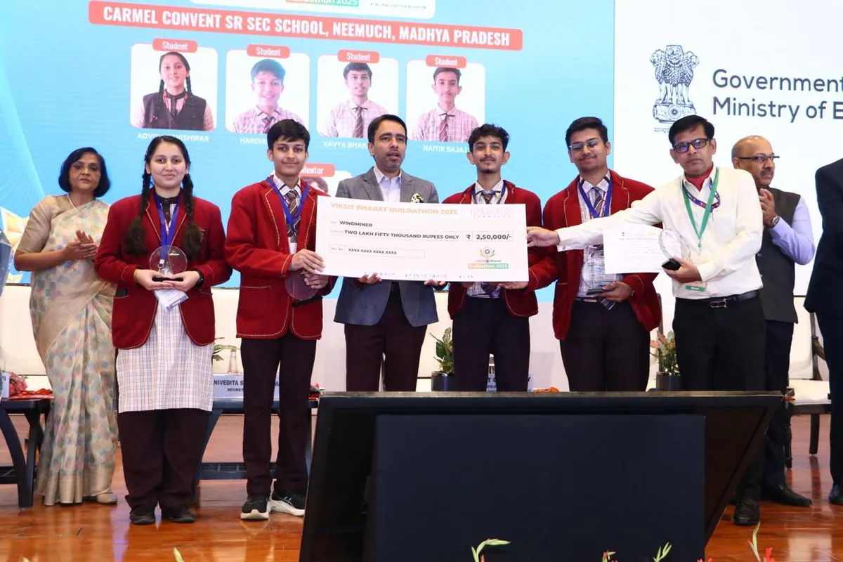 Students of Carmel Convent Sr. Sec. School, Neemuch, Madhya Pradesh, with the Windminer prize cheque at the Viksit Bharat Buildathon 2025 prize distribution in New Delhi